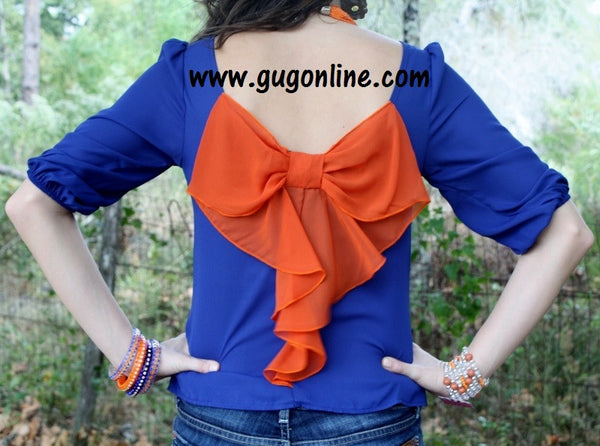 Last Chance Size Small | Quarterbacks' Girlfriend Bow Back Top in Blue