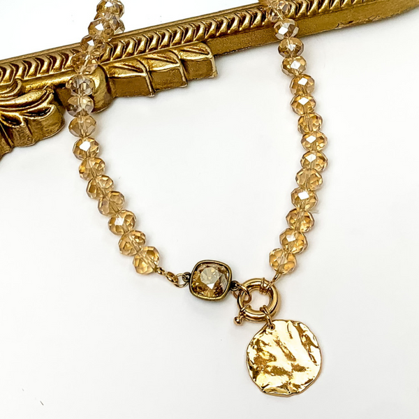 Pink Panache | Golden Shadow Crystal Beaded Necklace with Gold Tone Coin Charm and Golden Shadow Cushion Cut Crystal