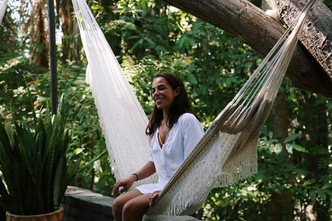 lady sitting on a hammock