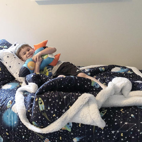 Boy with Universe Quilt Set and Universe Throw Sherpa