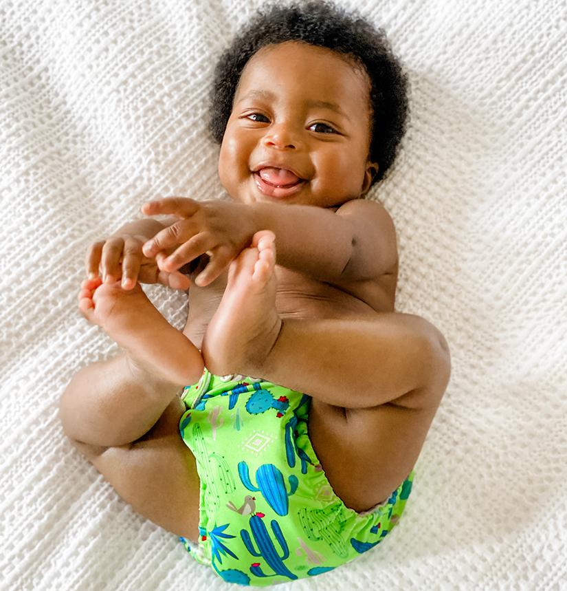 Baby in Cactus Verde Charlie Banana Diaper