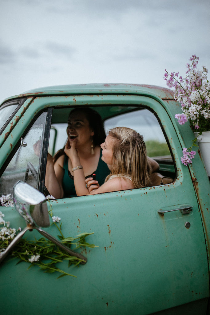 Old trucks in Alaska by Resolute Boutique