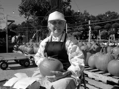 Janice Bardeen Kistler carving a pumpkin