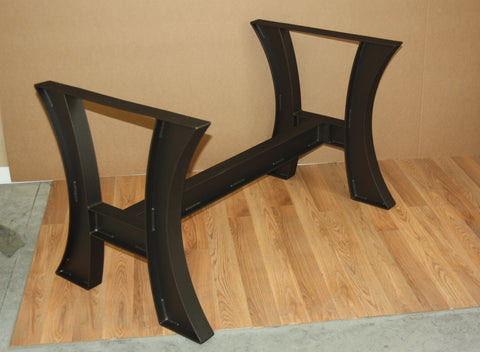 Curved plate table base finished in oil rubbed bronze