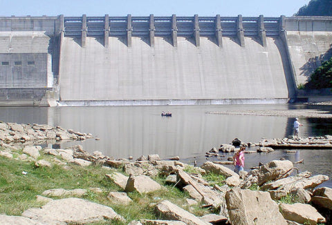 Fishing Down Stream Of Dam