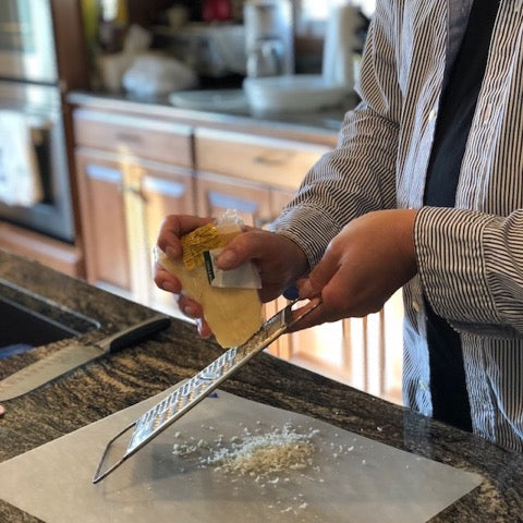 Grating cheese for digestion