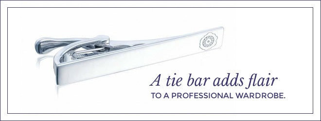 A tie bar adds flair to a professional wardrobe.