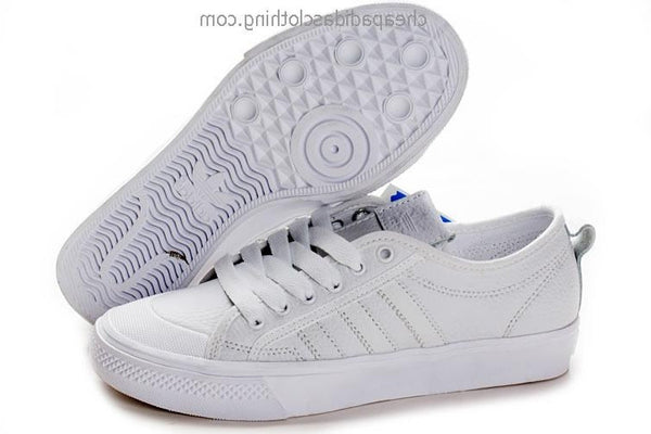 white adidas canvas trainers