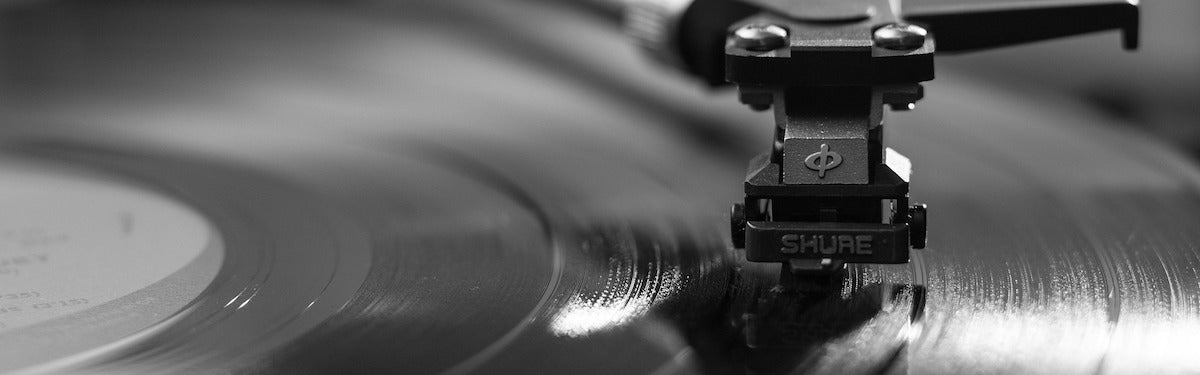 A turntable needle on a vinyl record