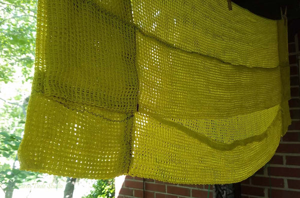 Chartreuse backing drying on the line.