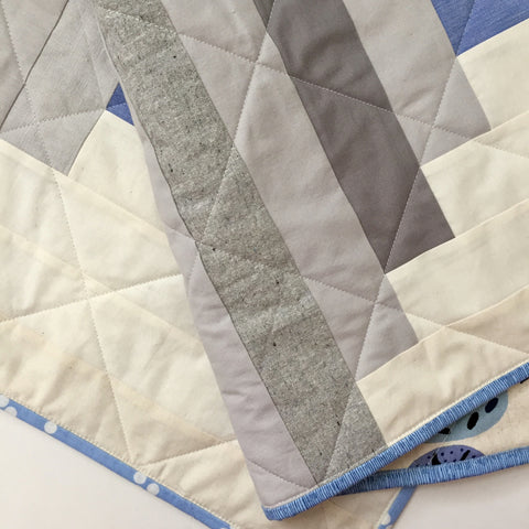 Detail of Neutral Log Cabin Baby Quilt by Salty Oat