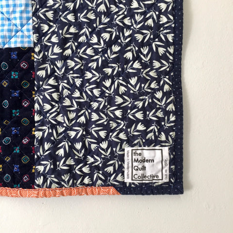The Modern Quilt Collective label