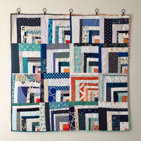 quarter log cabin quilt by the modern quilt collective