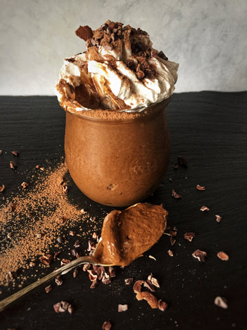 Rich chocolate mousse topped with whipped coconut cream