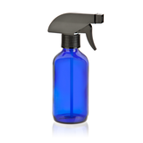 Spray bottle with shoe stretching serum