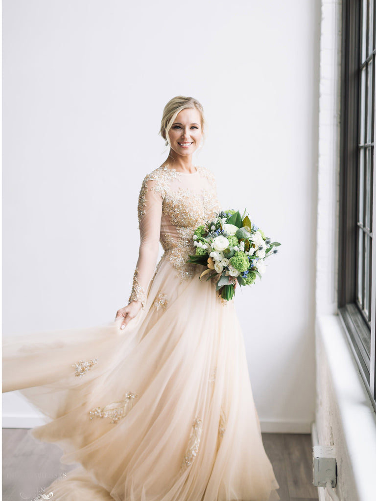 champagne long sleeve wedding dress