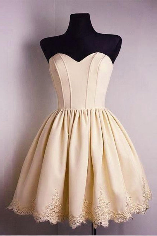 yellow strapless homecoming dress