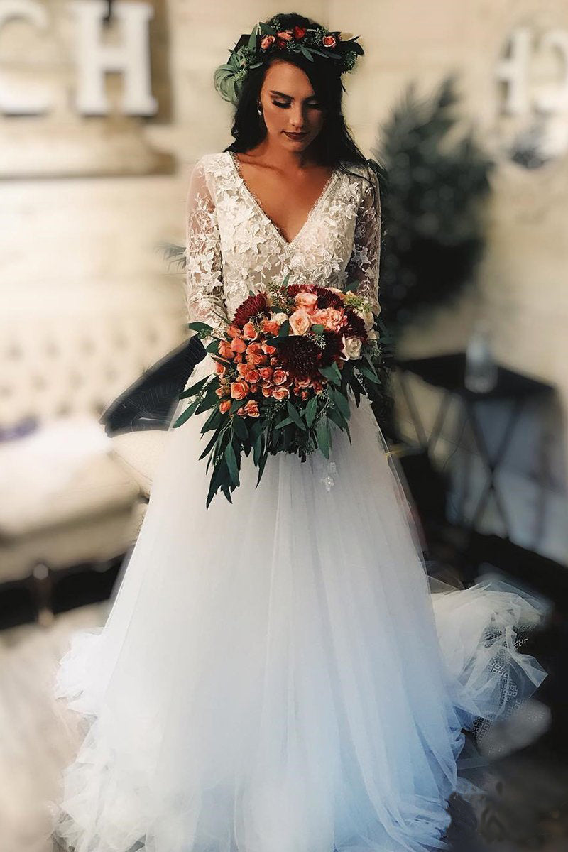 long sleeve lace and tulle wedding dress