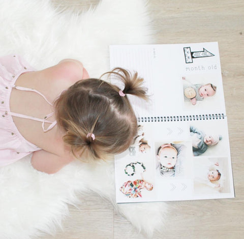 Admiring her sisters Monochrome Baby Book