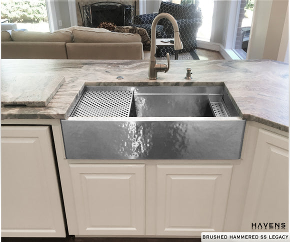 Stainless steel hammered farmhouse sink with a highly verstatile built in ledge, handcrafted in the USA by Havens.