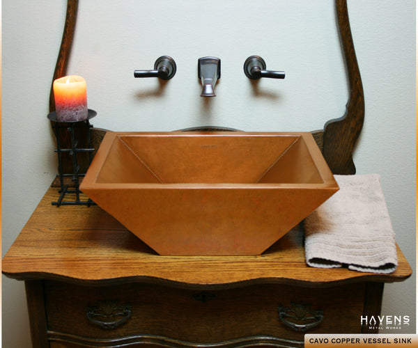 Copper vessel bathroom sink in a Havens client's bath area. Beautiful rustic luxury for the home lavatory.