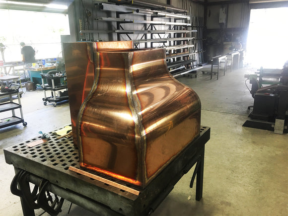 Custom copper range hood fabrication