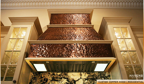 Hammered copper kitchen range hood built from American copper in the USA by Havens, a luxury home metal fabricator.