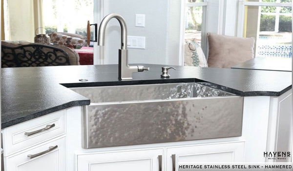 Stainless undermount farm sink installed in kitchen by Havens.