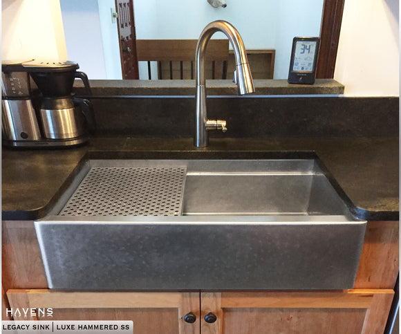 Custom kitchen sink in a beautiful hammered 16 gauge stainless steel finish.