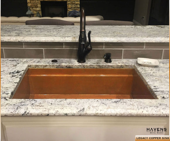 Single bowl custom copper sink with a workstation ledge, handcrafted from 14 gauge copper.