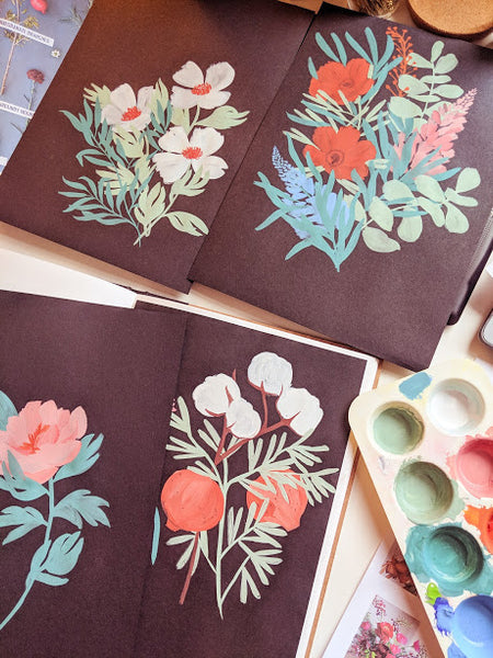 Annie's experiments painting florals directly onto black paper