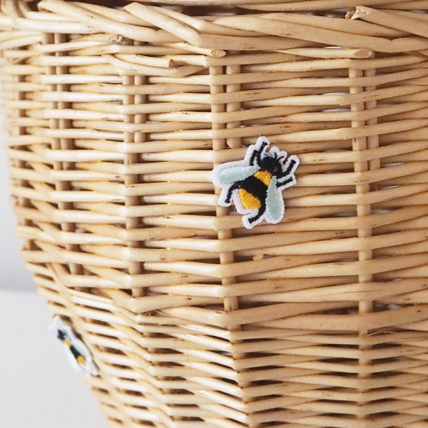 bee patched glued to basket bag for the cutest summer accessory