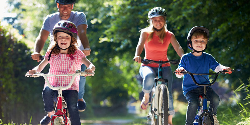 healthy family riding bikes