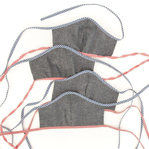 Clare V. Bisous Masks, 4 Pack - Laid Out with the Back Showing - All Have A Chambray Back