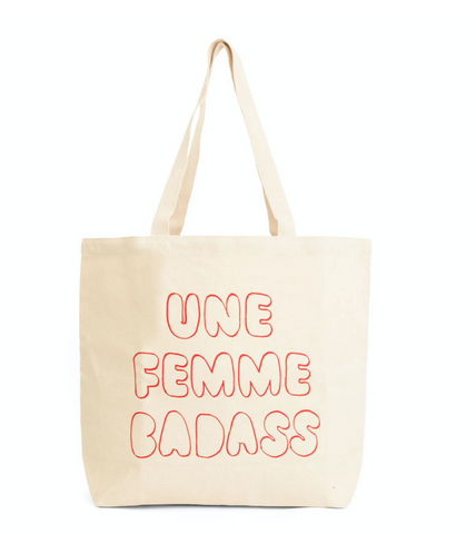 Canvas Tote Bag we made in collaboration with InStyle that reads Unne Femme Badass - translation - A Badass Woman, printed on the back
