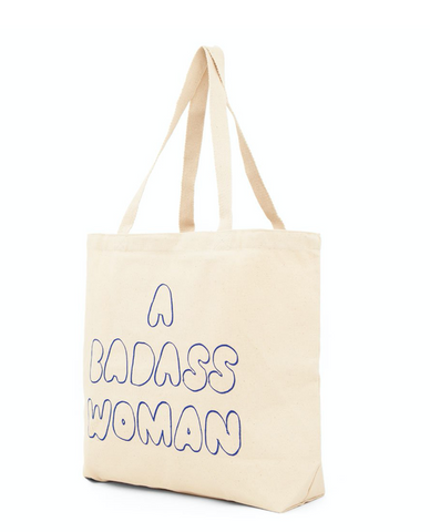 Canvas Tote Bag we made in collaboration with InStyle, front reads A Badass Woman