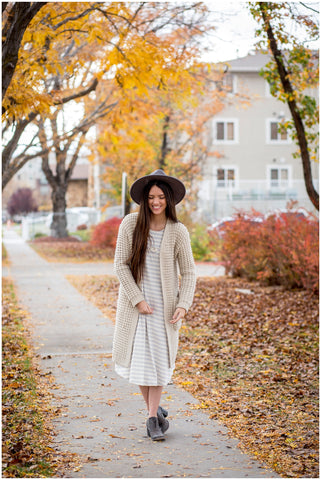 How to layer for winter includes wearing a sweater