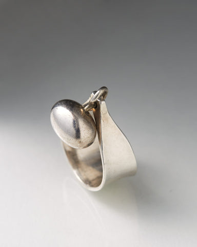 Sterling Silver Ring designed by Vivianna Torun Bülow-Hübe with a bobble on the top against a grey background