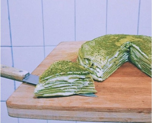 Fluffy rich double matcha mille crepe cake with creamy mildly sweet matcha green tea custard cream.