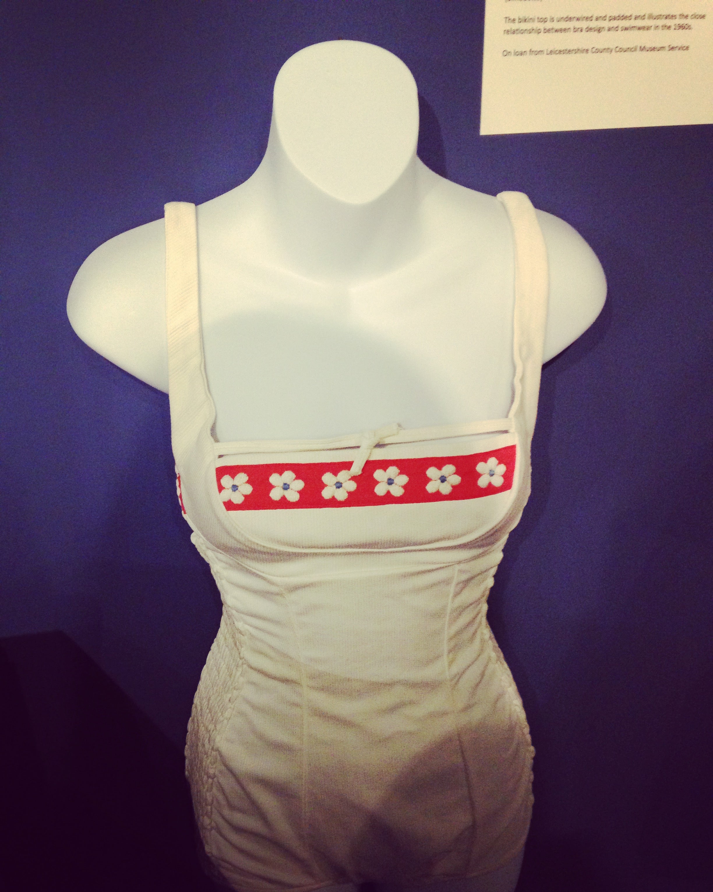 Women's white vintage swimsuit with daisies