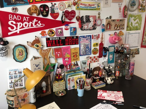 Gemma Correll's desk at home feat. Badge Bomb