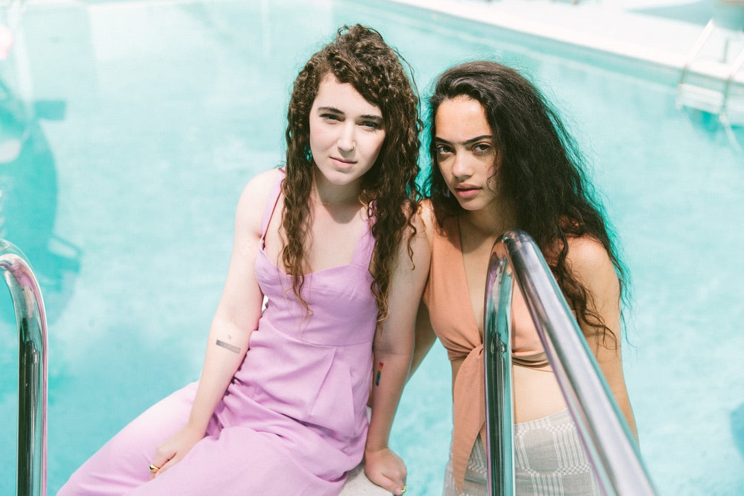 slim aarons-inspired poolside photoshoot with lgbtqia models for pride 2020