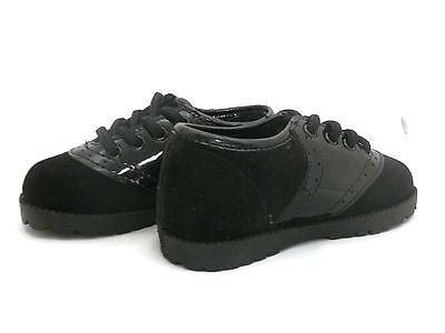 black saddle shoes