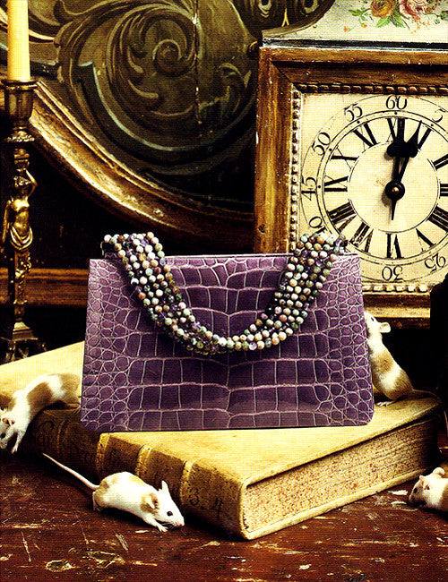 Mauve alligator necklace handle bag in antique setting