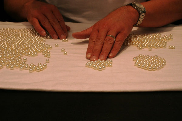 Sorting the South Sea pearls by color