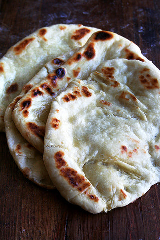 naan bread before putting on the pizza sauce