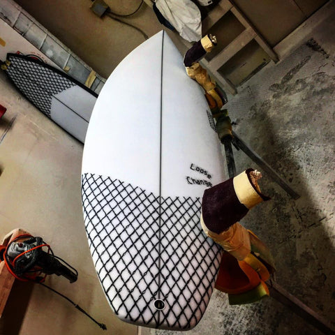 High performance groveler quad fin