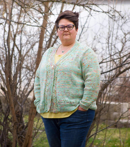 Photo of a woman wearing a cardigan sweater. The Lotusland Cardigan by Meghan Jones. 