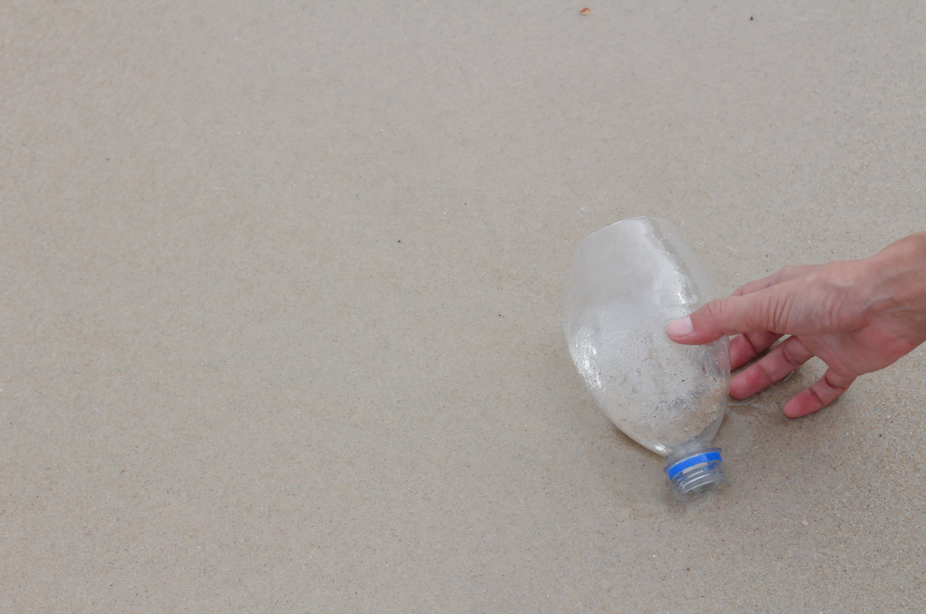 use old soft drink plastic bottles in the garden