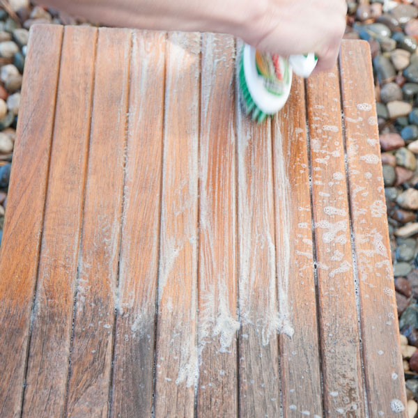 Step 4 : Spray on more Teak Cleaner and brush the surface again